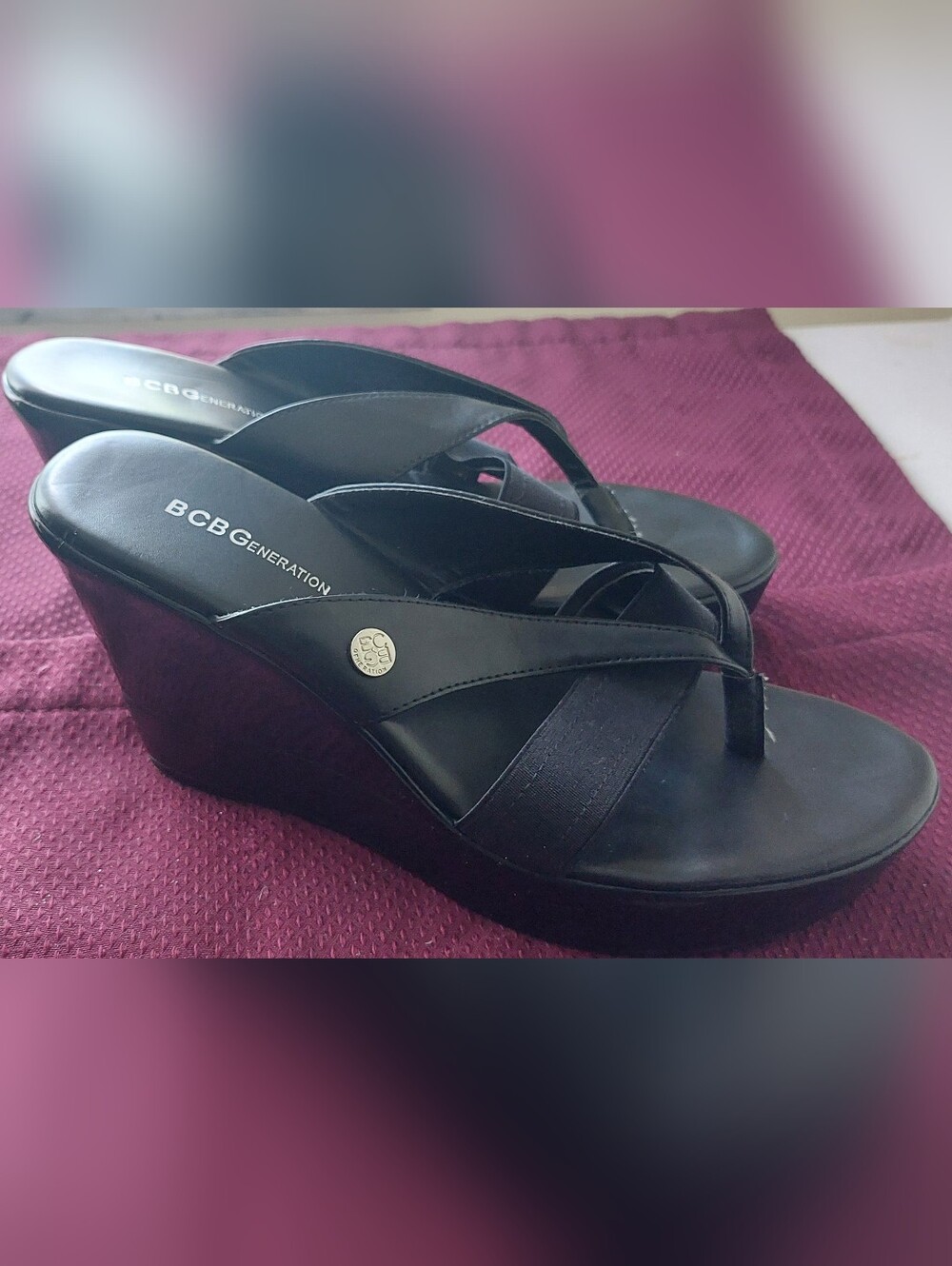 BCBGeneration Quickk Black Wedge Thong Sandals with Metallic Logo